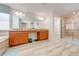 Bathroom with double vanity, granite countertop, soaking tub and walk-in shower at 4722 Sleepy Hollow Dr, Kissimmee, FL 34746