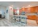 Bright kitchen with stainless steel appliances and an island at 4722 Sleepy Hollow Dr, Kissimmee, FL 34746