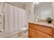 Bathroom with a shower/tub combo, granite vanity and toilet at 4722 Sleepy Hollow Dr, Kissimmee, FL 34746