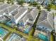 Aerial view of houses with private pools in a community at 4722 Sleepy Hollow Dr, Kissimmee, FL 34746