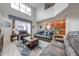 Spacious living area with high ceilings and a view of the pool at 4722 Sleepy Hollow Dr, Kissimmee, FL 34746