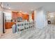 Eat-in kitchen with light tile floors and wood cabinets at 4722 Sleepy Hollow Dr, Kissimmee, FL 34746
