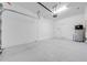 Spacious garage with overhead door and ample storage at 4722 Sleepy Hollow Dr, Kissimmee, FL 34746
