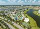 Aerial view of community pool and homes at 4722 Sleepy Hollow Dr, Kissimmee, FL 34746