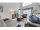 Comfortable living room with high ceilings and leather furniture at 4722 Sleepy Hollow Dr, Kissimmee, FL 34746
