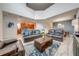 Open living room showcasing a high ceiling and leather couches at 4722 Sleepy Hollow Dr, Kissimmee, FL 34746