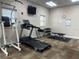 Well-equipped fitness center featuring treadmills, weights, and other exercise machines at 5300 S Atlantic Ave # 19-306, New Smyrna Beach, FL 32169