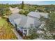 Single-story house, gray roof, and surrounding neighborhood view at 205 Bell Tower W Xing, Kissimmee, FL 34759