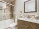 Modern bathroom with a glass shower door and updated fixtures at 205 Bell Tower W Xing, Kissimmee, FL 34759
