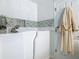 Walk-in bathtub with tiled surround and modern fixtures at 205 Bell Tower W Xing, Kissimmee, FL 34759