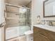 Updated bathroom features a walk-in shower, modern vanity, and elegant tile at 205 Bell Tower W Xing, Kissimmee, FL 34759