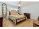 Spacious bedroom with a king-size bed and ample closet space at 205 Bell Tower W Xing, Kissimmee, FL 34759