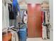 Large walk-in closet with ample shelving and hanging space at 205 Bell Tower W Xing, Kissimmee, FL 34759