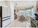 Bright kitchen with breakfast nook, modern appliances, and ample cabinet space at 205 Bell Tower W Xing, Kissimmee, FL 34759