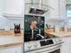 Modern kitchen with sleek countertops and glass cooktop at 205 Bell Tower W Xing, Kissimmee, FL 34759