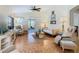 Relaxing living room featuring a comfy couch and access to a back patio at 205 Bell Tower W Xing, Kissimmee, FL 34759
