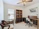 Home office with a desk, chair, and built-in shelving at 205 Bell Tower W Xing, Kissimmee, FL 34759