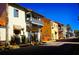 Mediterranean-style buildings line a brick-paved street at 205 Bell Tower W Xing, Kissimmee, FL 34759