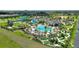 Aerial view of community amenities including pools and a golf course at 1431 Olympic Club Blvd, Champions Gate, FL 33896