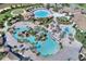 Resort-style community pool with expansive deck and waterslide at 1431 Olympic Club Blvd, Champions Gate, FL 33896