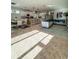 Open concept living and kitchen with ample natural light at 1837 Hickory Bluff Rd, Kissimmee, FL 34744