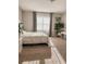 Bright bedroom with neutral carpet and large windows at 1837 Hickory Bluff Rd, Kissimmee, FL 34744