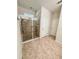Bathroom with large shower and tiled flooring at 1837 Hickory Bluff Rd, Kissimmee, FL 34744