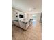 Large living room with sectional sofa and open floor plan at 1837 Hickory Bluff Rd, Kissimmee, FL 34744