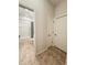 View down hallway with access to bathroom and bedrooms at 1837 Hickory Bluff Rd, Kissimmee, FL 34744