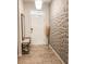 Modern entryway featuring a geometric accent wall at 1837 Hickory Bluff Rd, Kissimmee, FL 34744