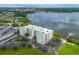 Luxury waterfront condo building with lake and parking views at 4177 N Orange Blossom Trl # 210, Orlando, FL 32804