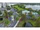 Community pool and clubhouse with lush landscaping at 4177 N Orange Blossom Trl # 210, Orlando, FL 32804