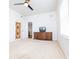 Spacious bedroom with ceiling fan and dresser at 4177 N Orange Blossom Trl # 210, Orlando, FL 32804