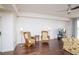 Living room with hardwood floors and wicker armchairs, offering a relaxing atmosphere at 4177 N Orange Blossom Trl # 210, Orlando, FL 32804
