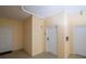 Building hallway with neutral walls and doors to individual units at 4177 N Orange Blossom Trl # 210, Orlando, FL 32804