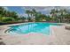 Inviting community pool with brick patio at 4177 N Orange Blossom Trl # 210, Orlando, FL 32804