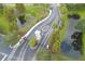 Aerial view of community entrance with gate and landscaping at 4177 N Orange Blossom Trl # 210, Orlando, FL 32804