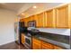 Stainless steel appliances and granite countertops in kitchen at 4177 N Orange Blossom Trl # 210, Orlando, FL 32804