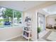 Bright and airy lobby with bookcase and seating area at 4177 N Orange Blossom Trl # 210, Orlando, FL 32804