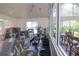 Bright fitness center with various exercise equipment and large windows at 4177 N Orange Blossom Trl # 210, Orlando, FL 32804