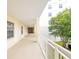 Covered walkway with white railing, offering a pleasant outdoor space at 4177 N Orange Blossom Trl # 210, Orlando, FL 32804