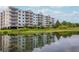 Lakeside community featuring a multi-story building with balconies at 4177 N Orange Blossom Trl # 210, Orlando, FL 32804