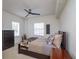 Bright bedroom with a double bed, dresser, and large window at 4177 N Orange Blossom Trl # 210, Orlando, FL 32804