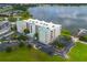 Lakefront condo building with parking and boat dock at 4177 N Orange Blossom Trl # 210, Orlando, FL 32804