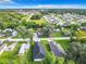 Aerial view of two new construction homes and surrounding neighborhood at 623 Sylvan Ramble Rd, Davenport, FL 33837