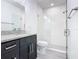 Modern bathroom with granite vanity and glass shower at 623 Sylvan Ramble Rd, Davenport, FL 33837