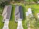 An overhead view of two new homes with driveways and yards at 623 Sylvan Ramble Rd, Davenport, FL 33837