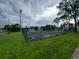 Well-maintained tennis court, perfect for recreational activities at 2616 Lemon Tree Ln # F, Orlando, FL 32839