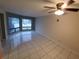 Spacious living room with tile floors and ceiling fan at 2616 Lemon Tree Ln # F, Orlando, FL 32839