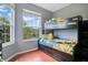 Bedroom with bunk bed, large window and ample closet space at 2300 Silver Palm Dr # 303, Kissimmee, FL 34747
